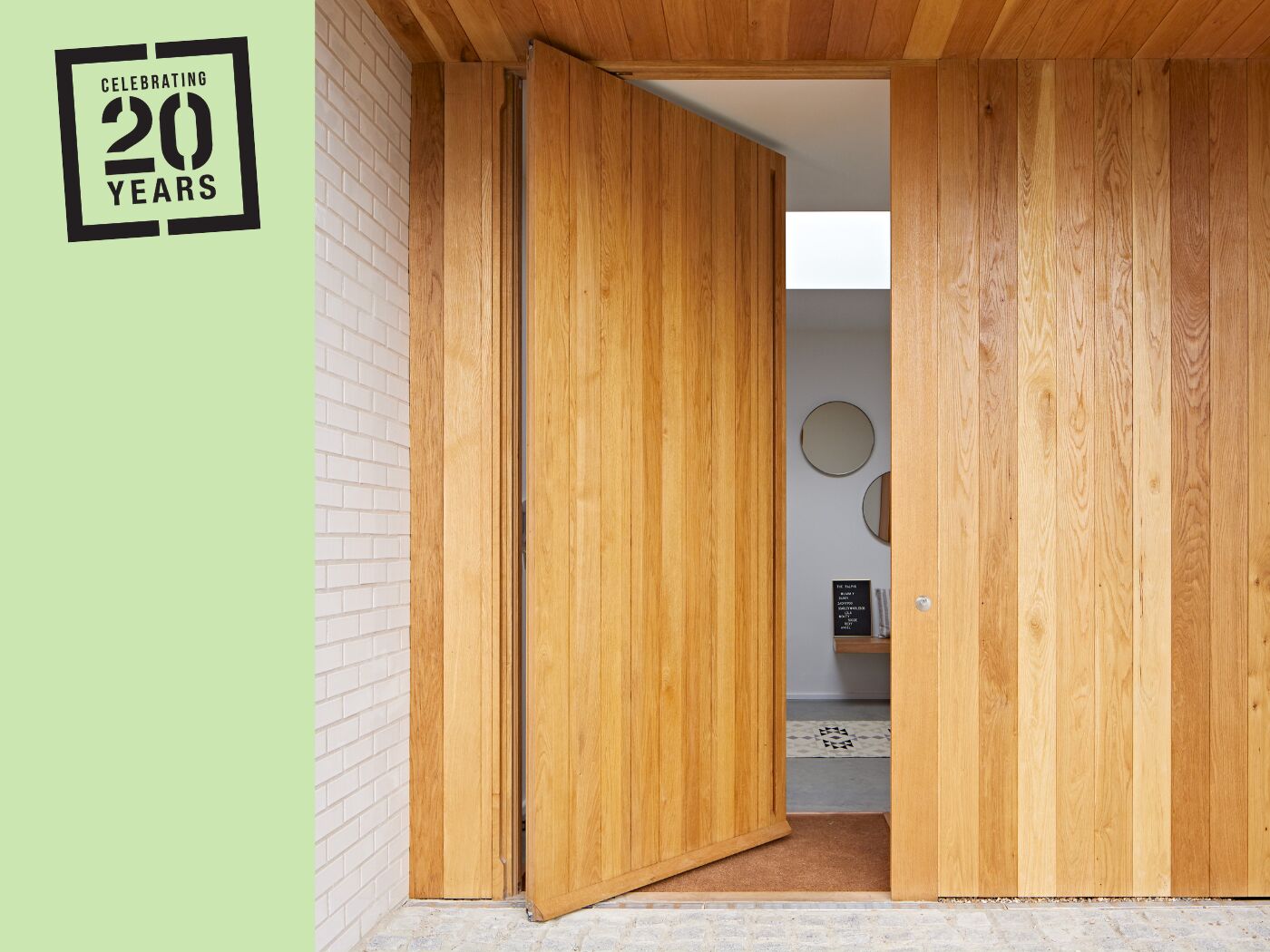 Property 'Chalk' featuring a Porto pivot design in oak with cladding.