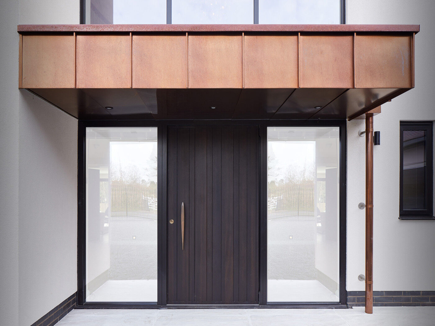 Copper overhang with bronze handle