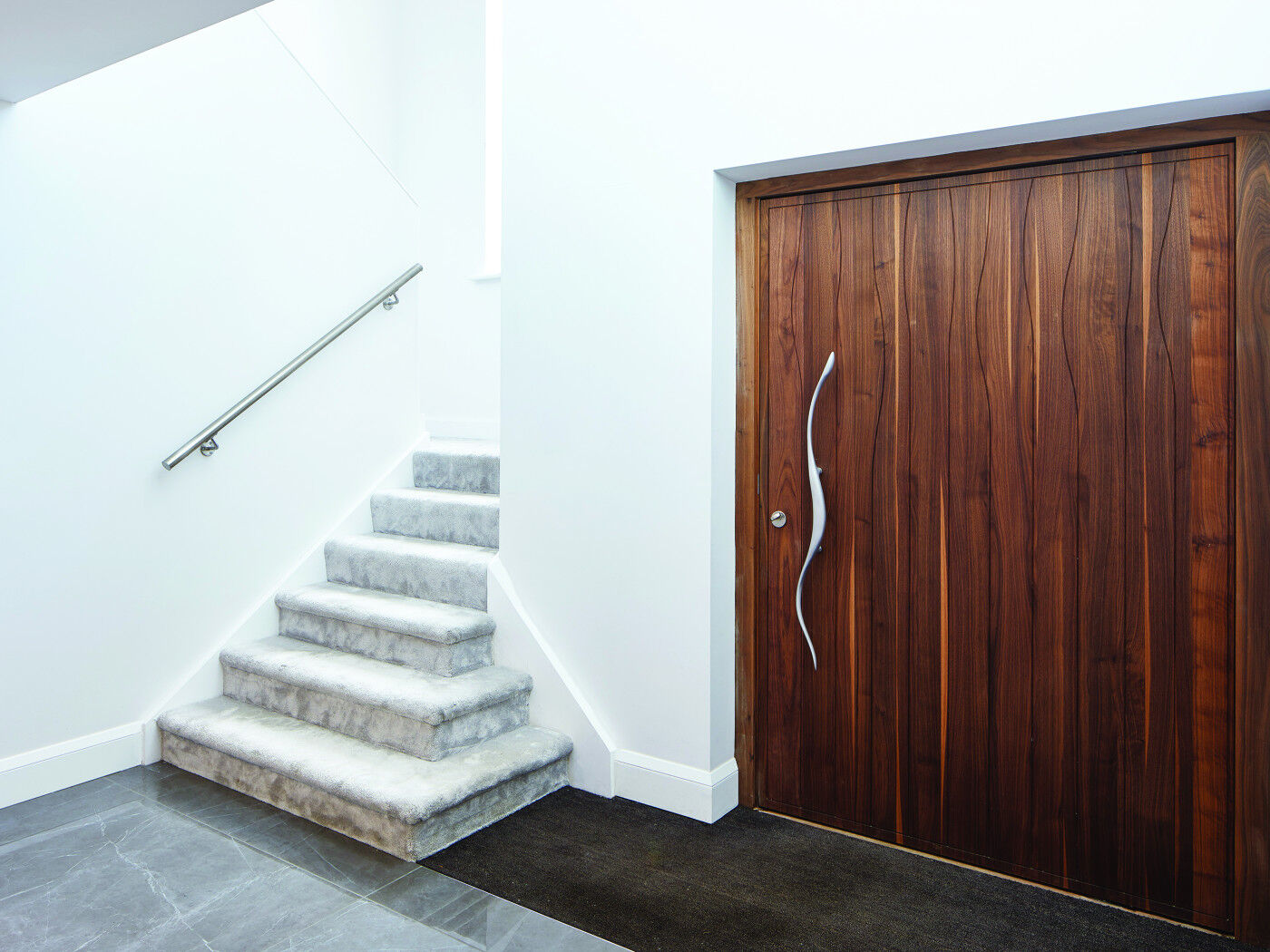Choose a statement handle, this one follows the wave pattern on the door