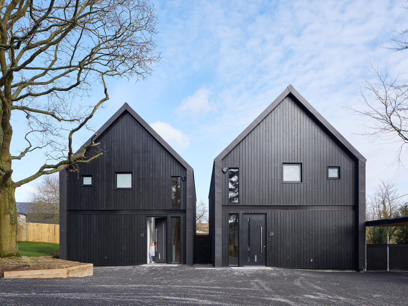 Black door with black cladding