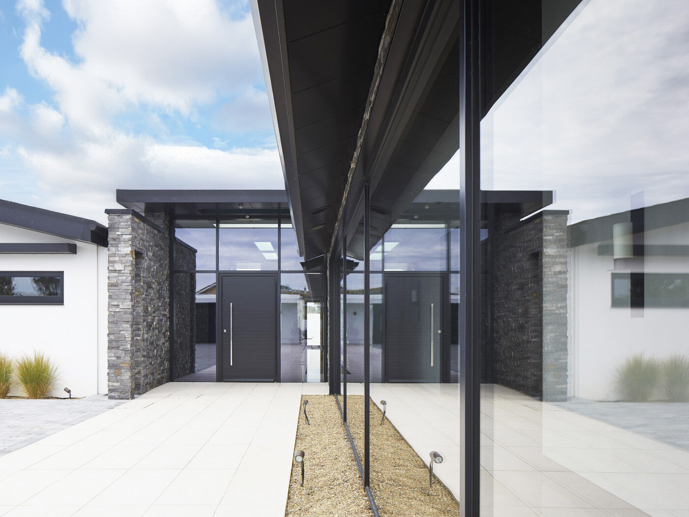 The monochrome design makes a statement within impressive glazing