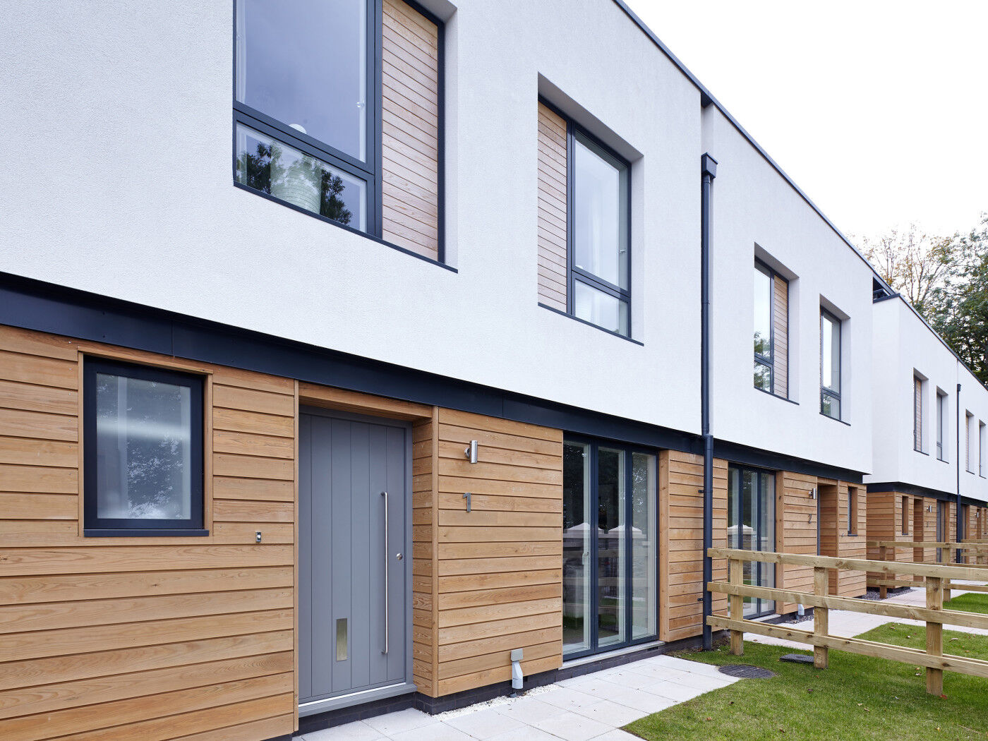 The owners of this house chose a grey front door to go with their mixed material frontage