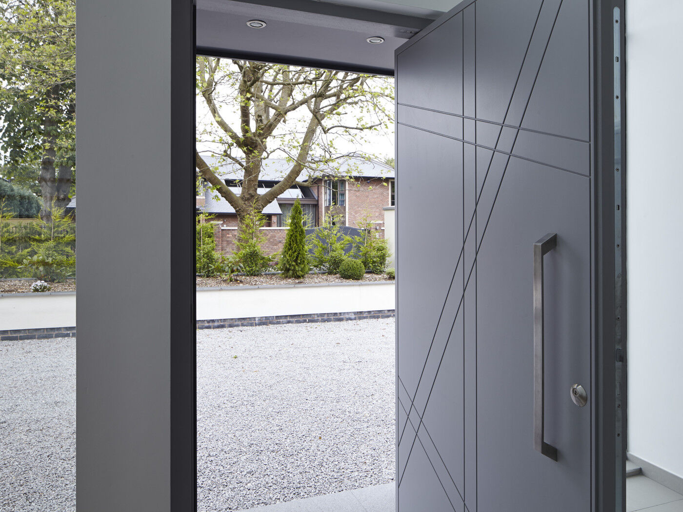 A slanted square edged solid stainless steel pull handle