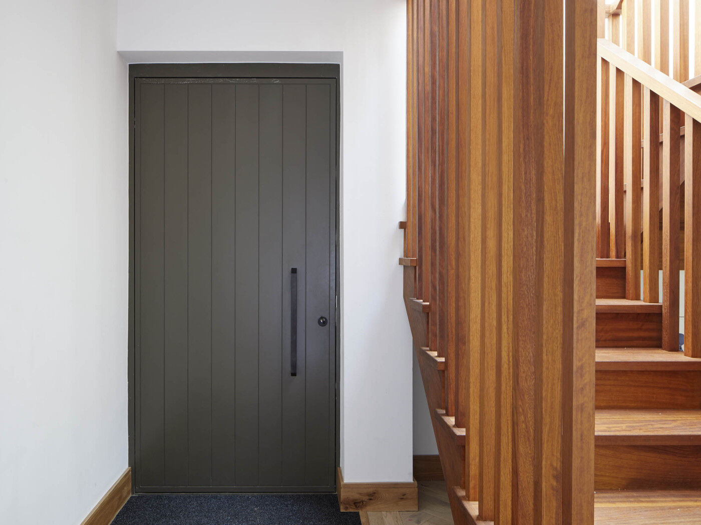 black door handle green door