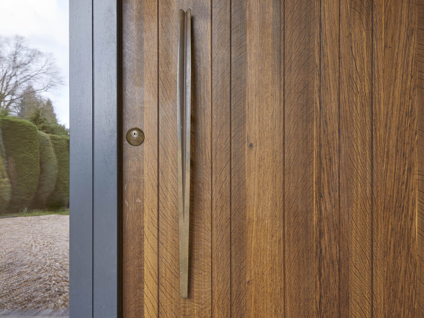 A lacquered finish will be most suitable if the door will be more exposed