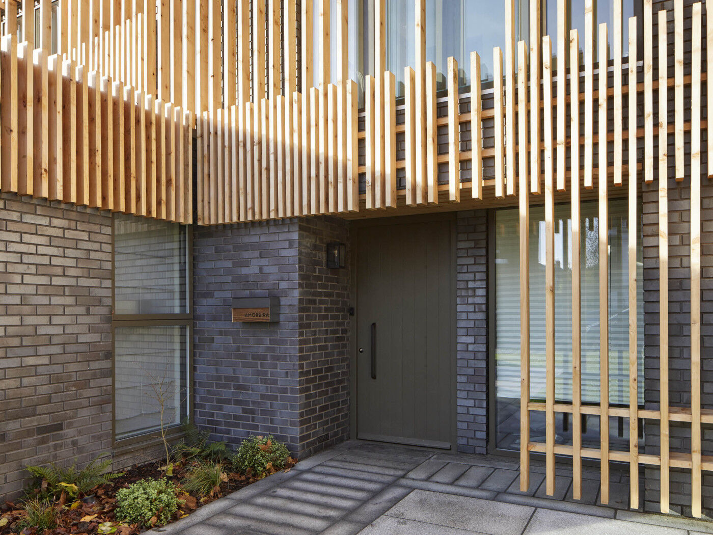 Essential factors house with cladding