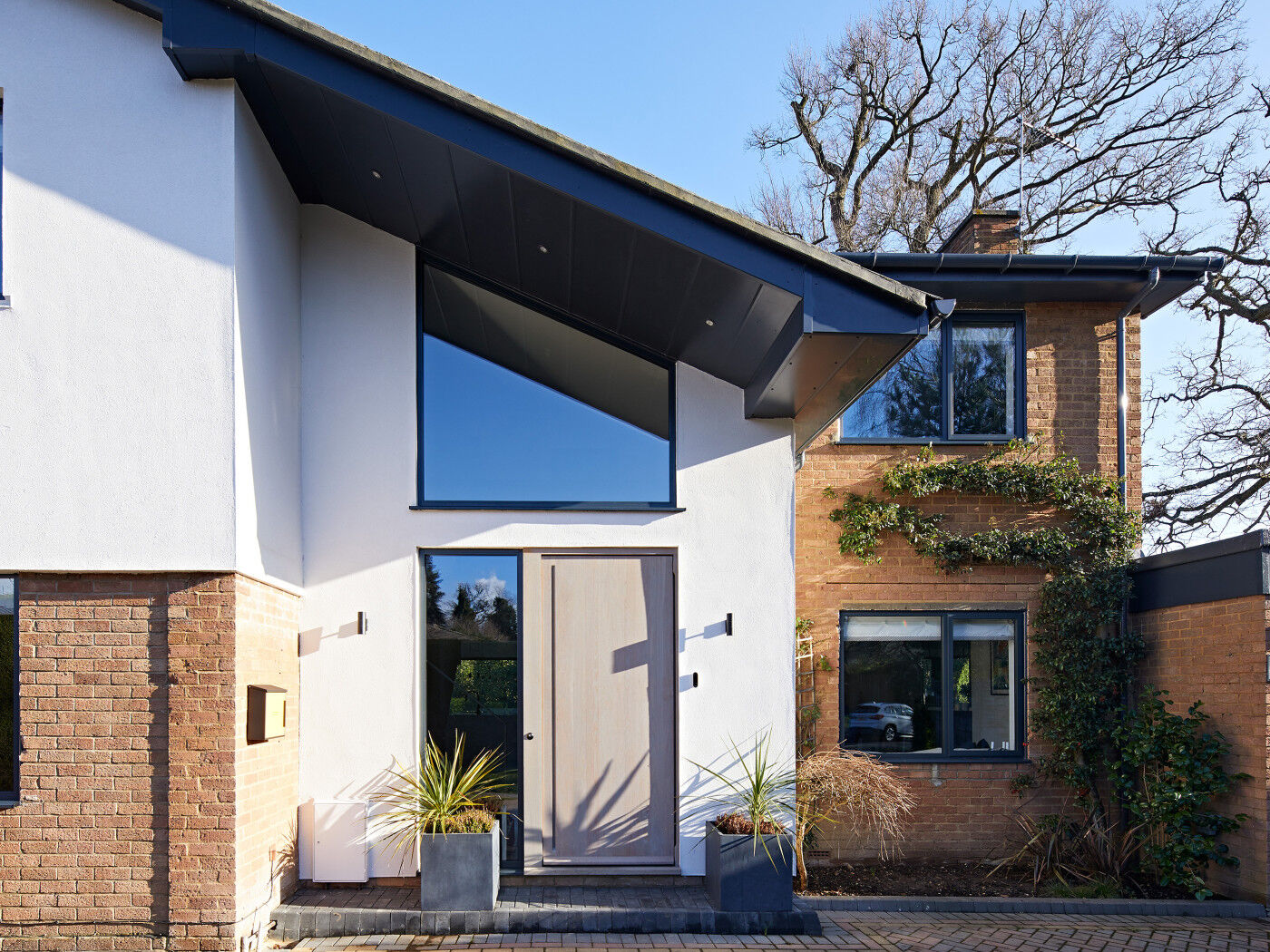 The roof & soffit of this house create an extensive overhang