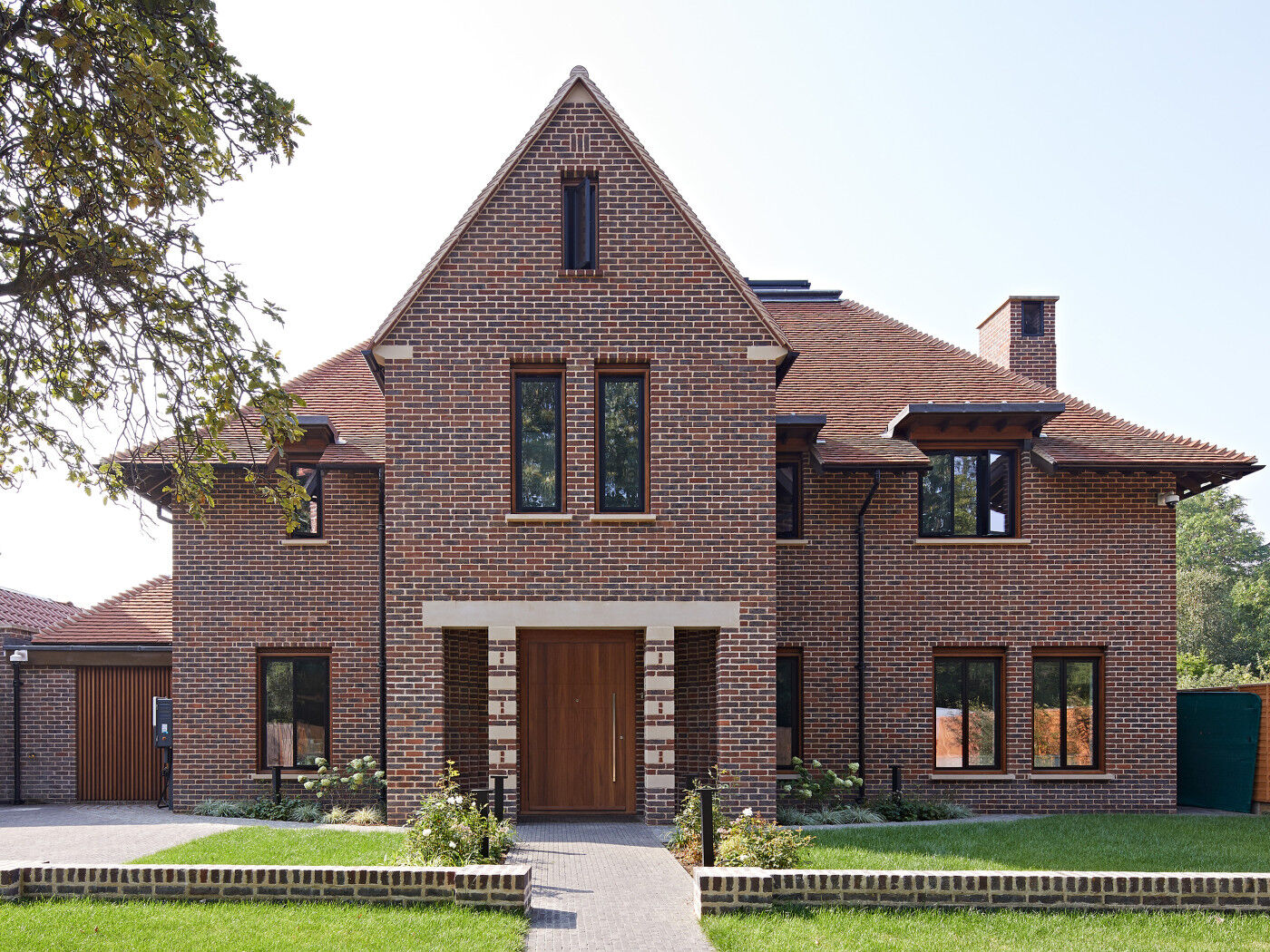 This more traditionally styled brick house has been given a contemporary update with our Quattro front door