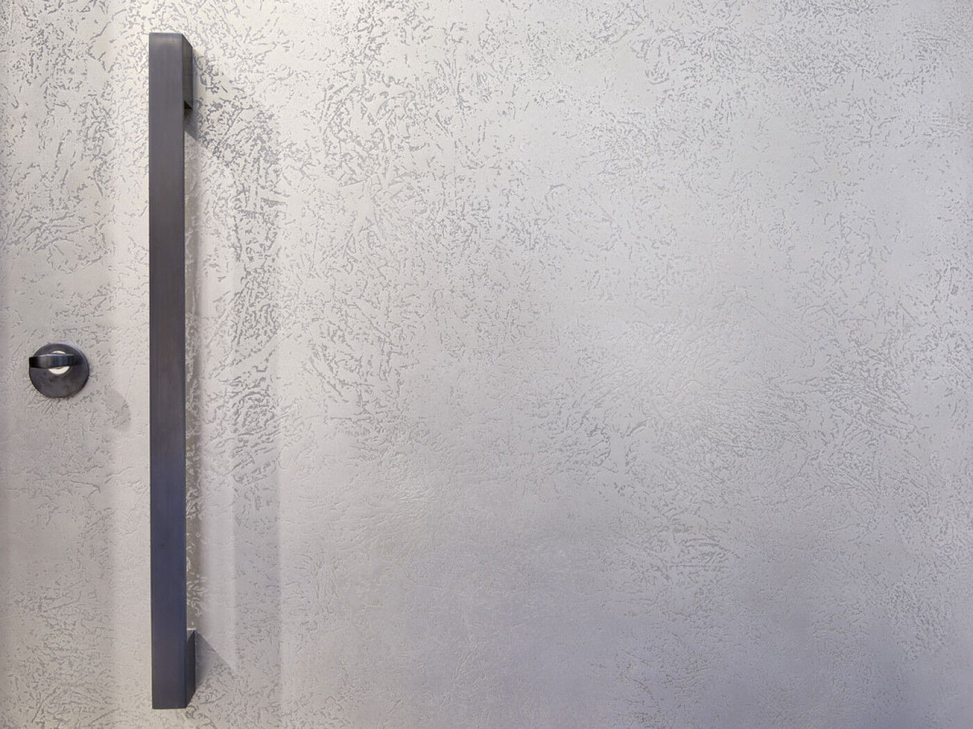 Close up of aged silver bronze finish