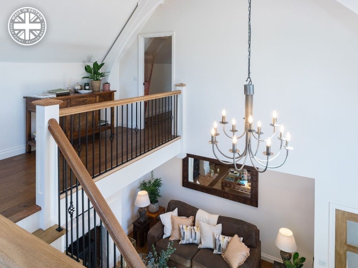 Wrought iron chandeliers are available from Nigel Tyas.