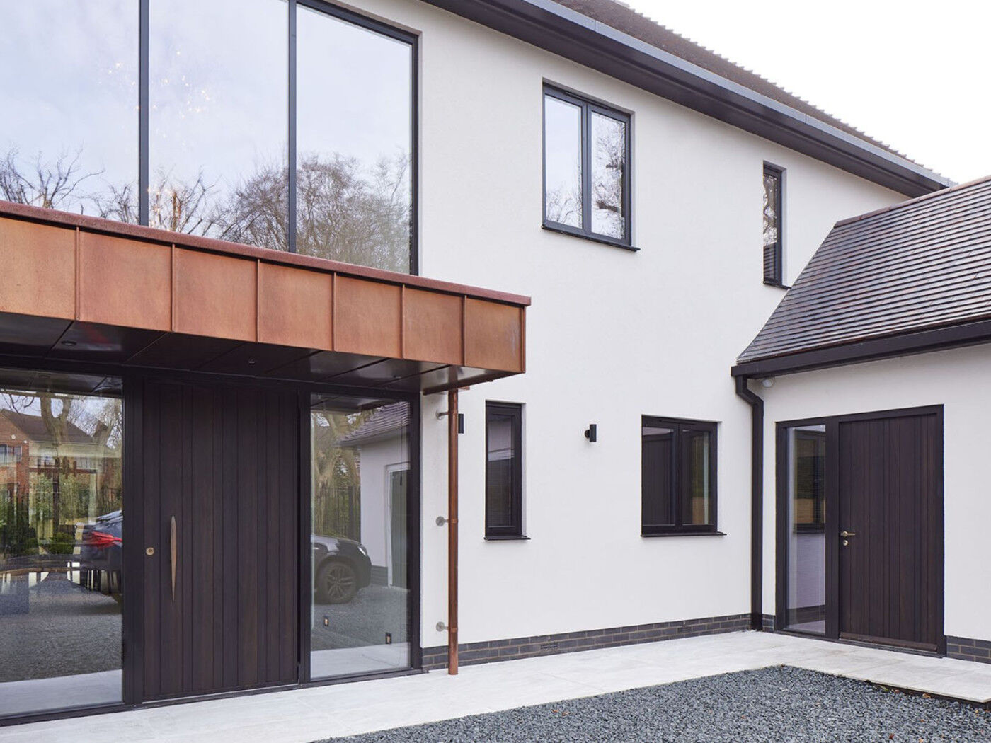 The front door and side door have the same design and finish but different style handles.