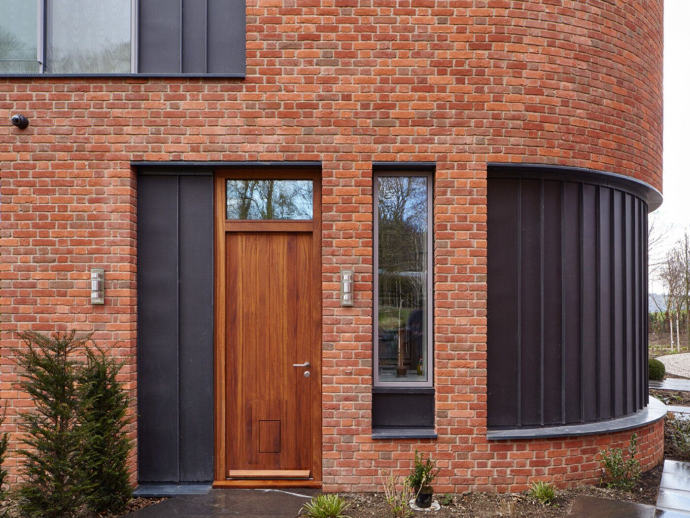 The back door matches the front door but features a lever handle and a concealed cat flap.