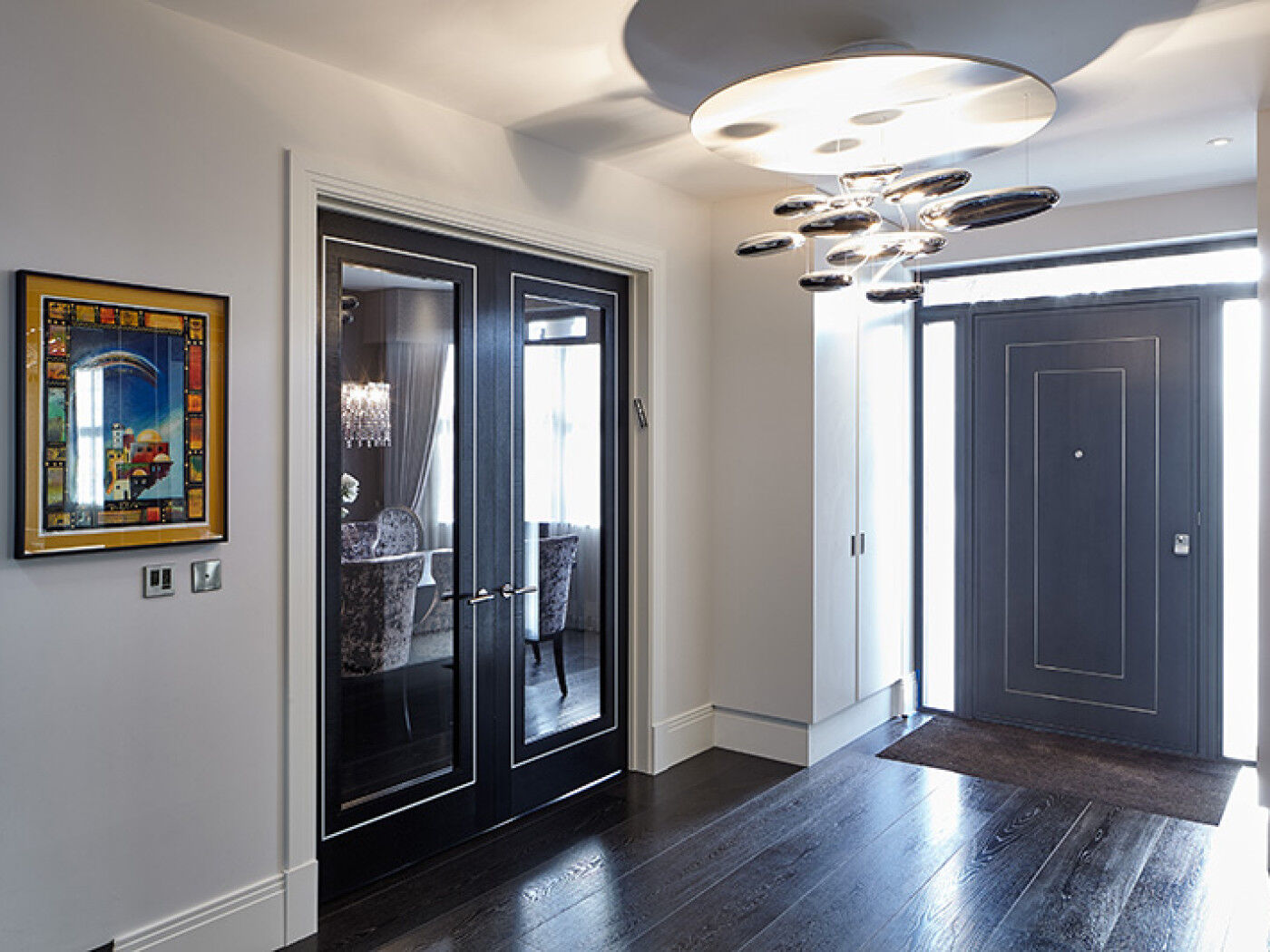 using a  simliar design on the internal doors to match the front doors is perfect here