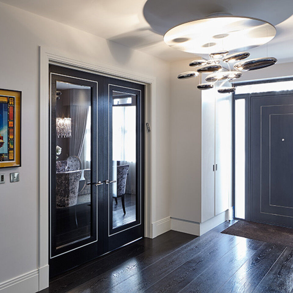 using a  simliar design on the internal doors to match the front doors is perfect here