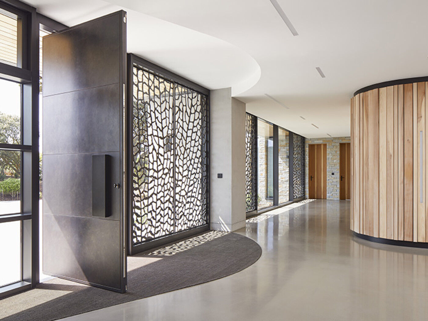 A great example of how different finishes can really work in this hall