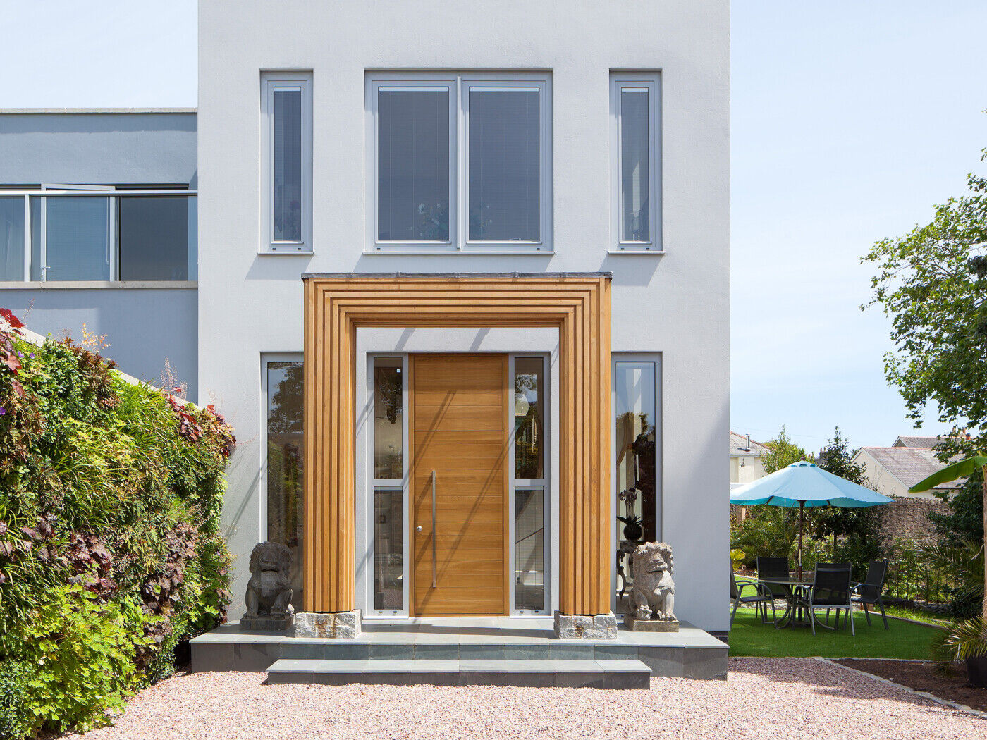 Making a door look bigger than it actually is helps create a grand entrance