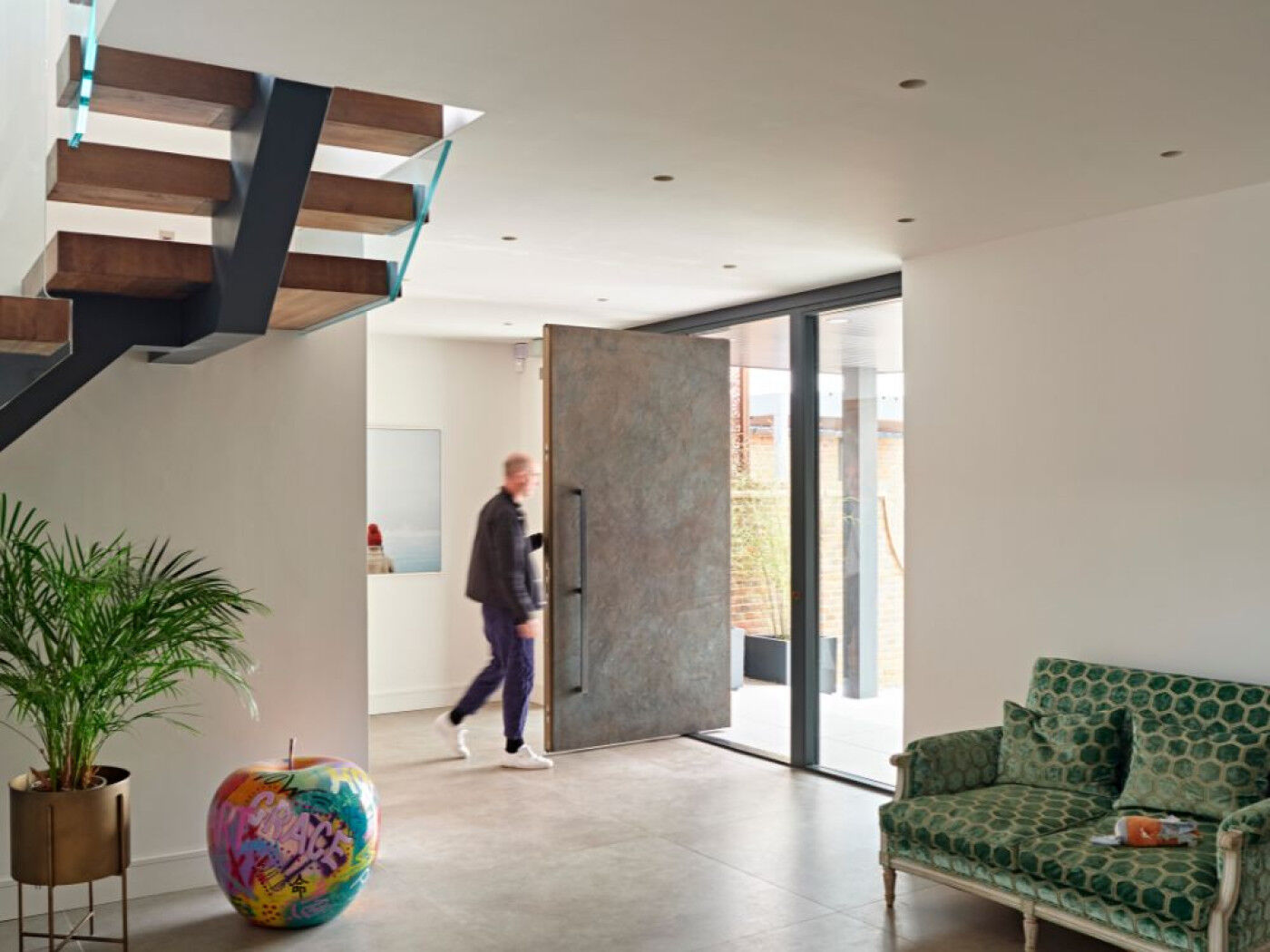 Make a style statement with a large bronze pivot door