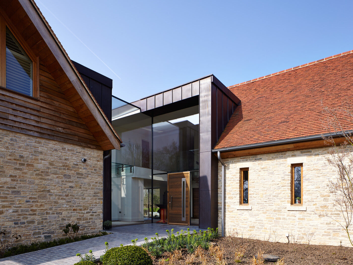 The Urban Front door complements the other materials featured on this home
