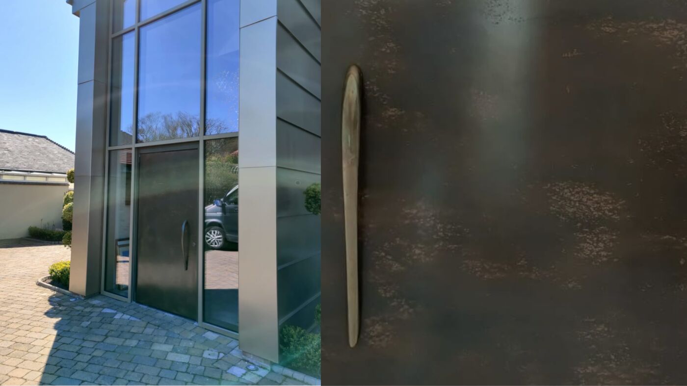 Client photo of  our bronze door in our 111 finish with BZ4 handle
