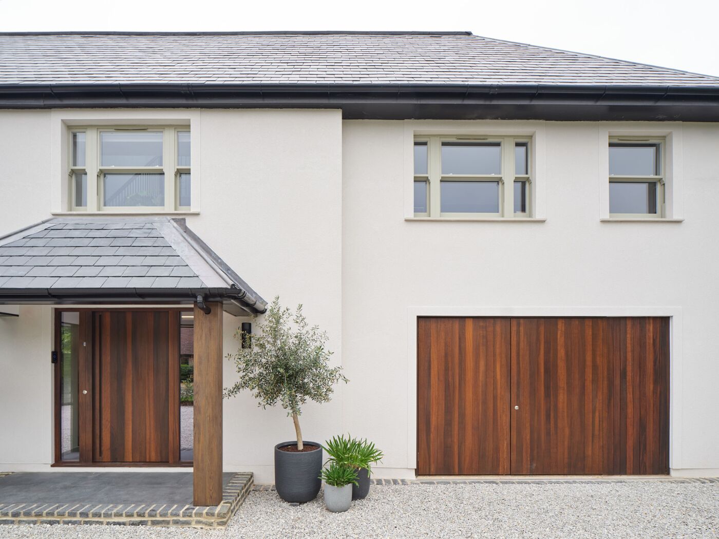 The front and garage doors work beautifully together on this renovation project