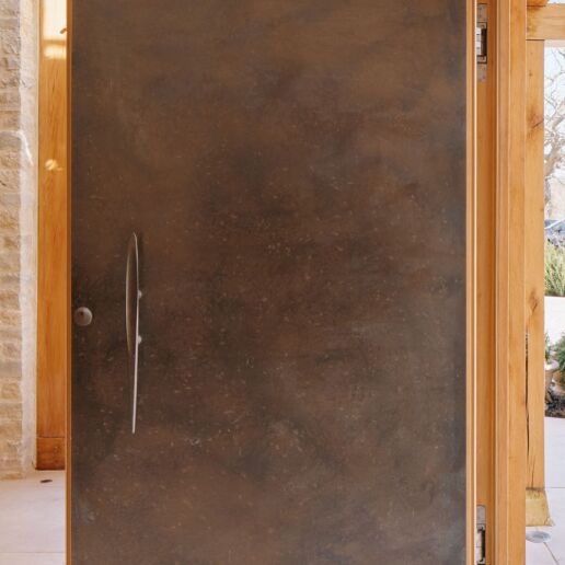 Bronze door with oak frame
