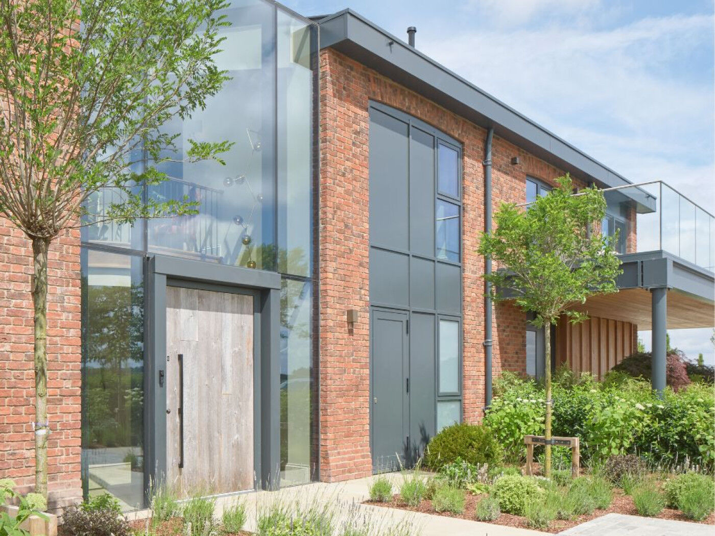 Barn door with Milano V internal in RAL grey13