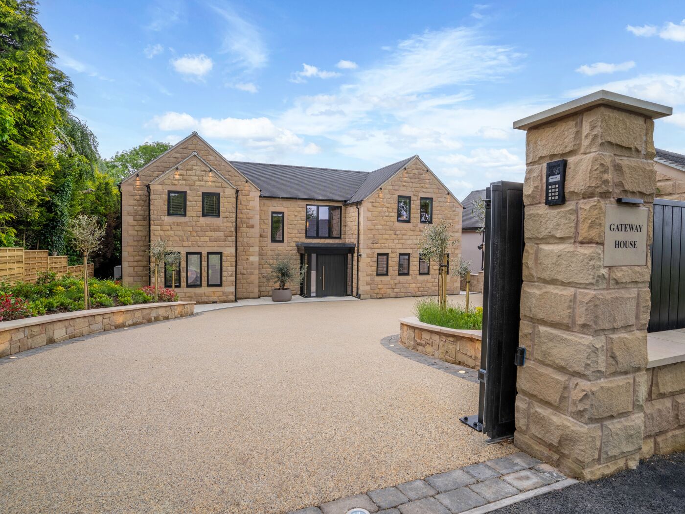 Front of Casamia House with gatepost Urban Front