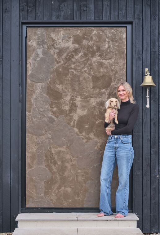 Portrait Cuttle Brook Barn Jade and dog and door close up