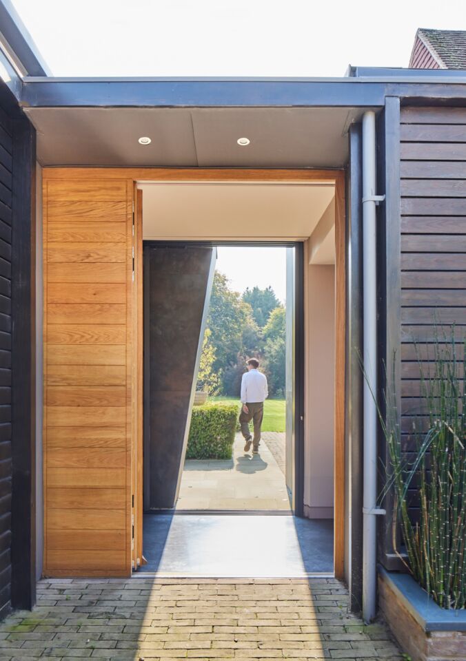 Portrait looking through the door Fir Tree House