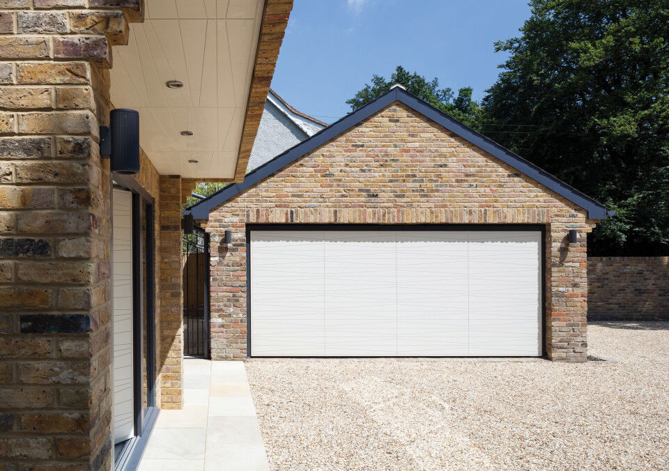 The matching garage door is also the Urban Front Milano design