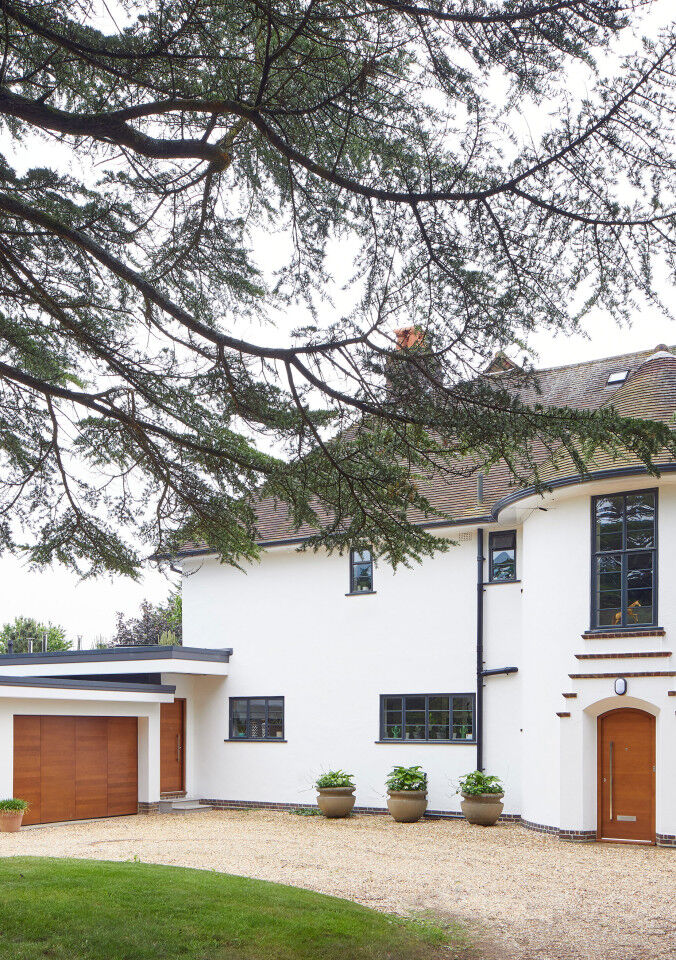 A 1930's house remodelled with matching front and garage doors