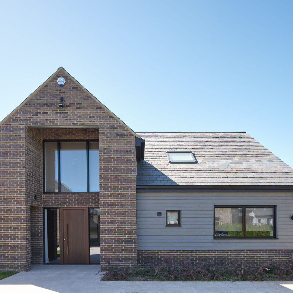 Rockwell house design 5 with Raw V fumed oak option11 black door Urban Front