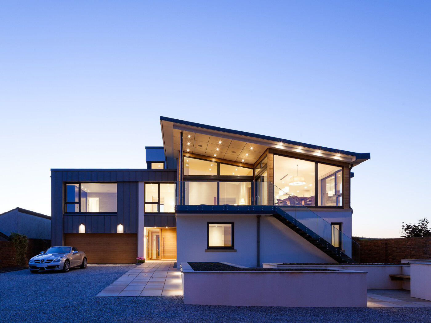 The vast expanses of glass further highlight the contemporary design