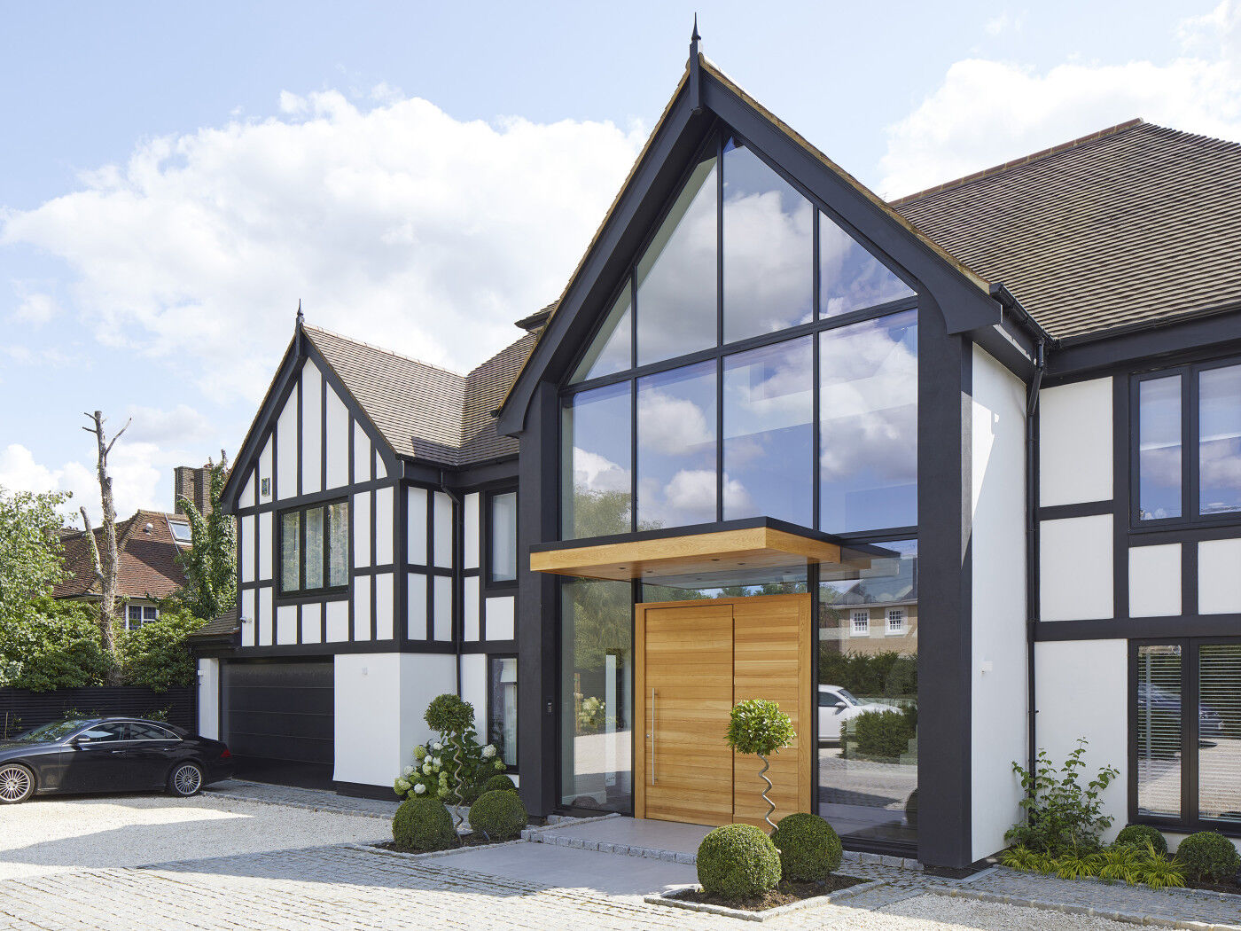 Traditional property with a parma e98 flush pivot door in european oak