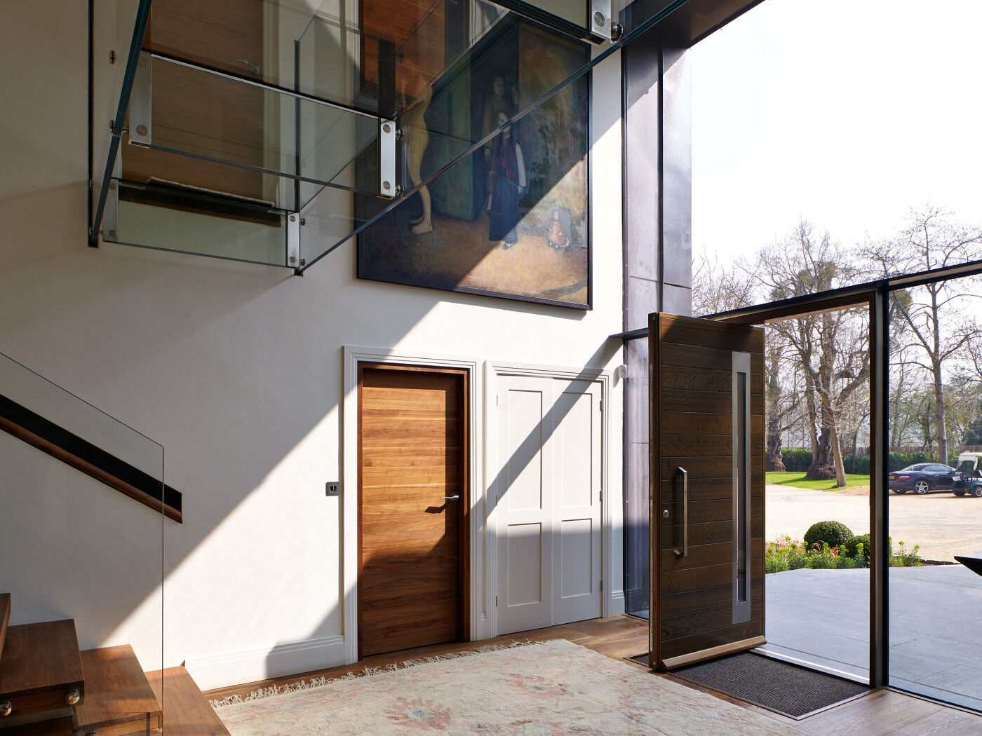 The glass frontage sheds spectacular light on the front and internal doors