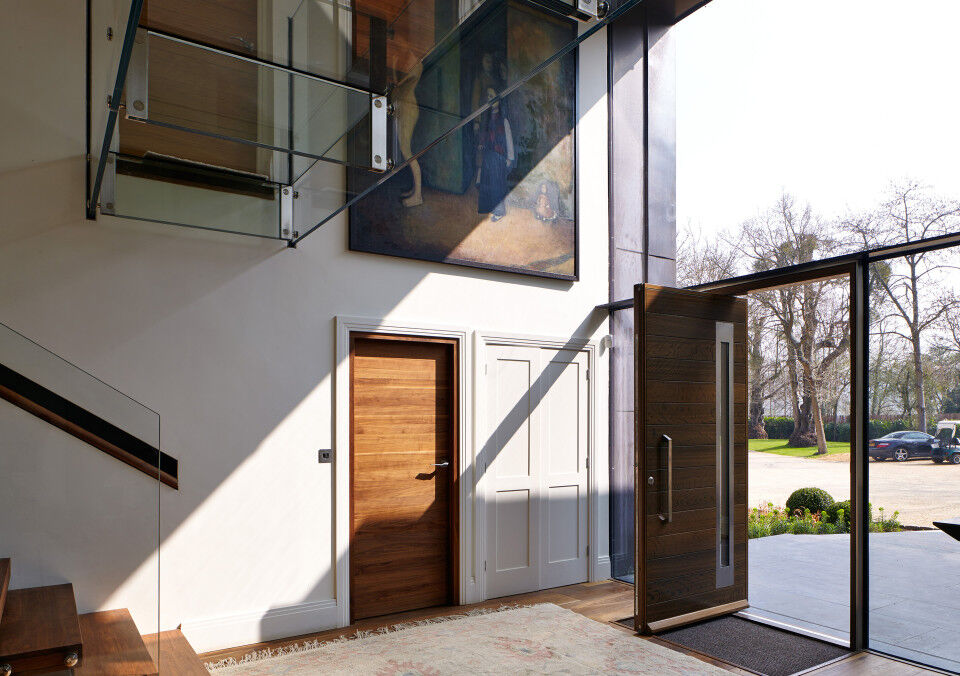 The glass frontage sheds spectacular light on the front and internal doors