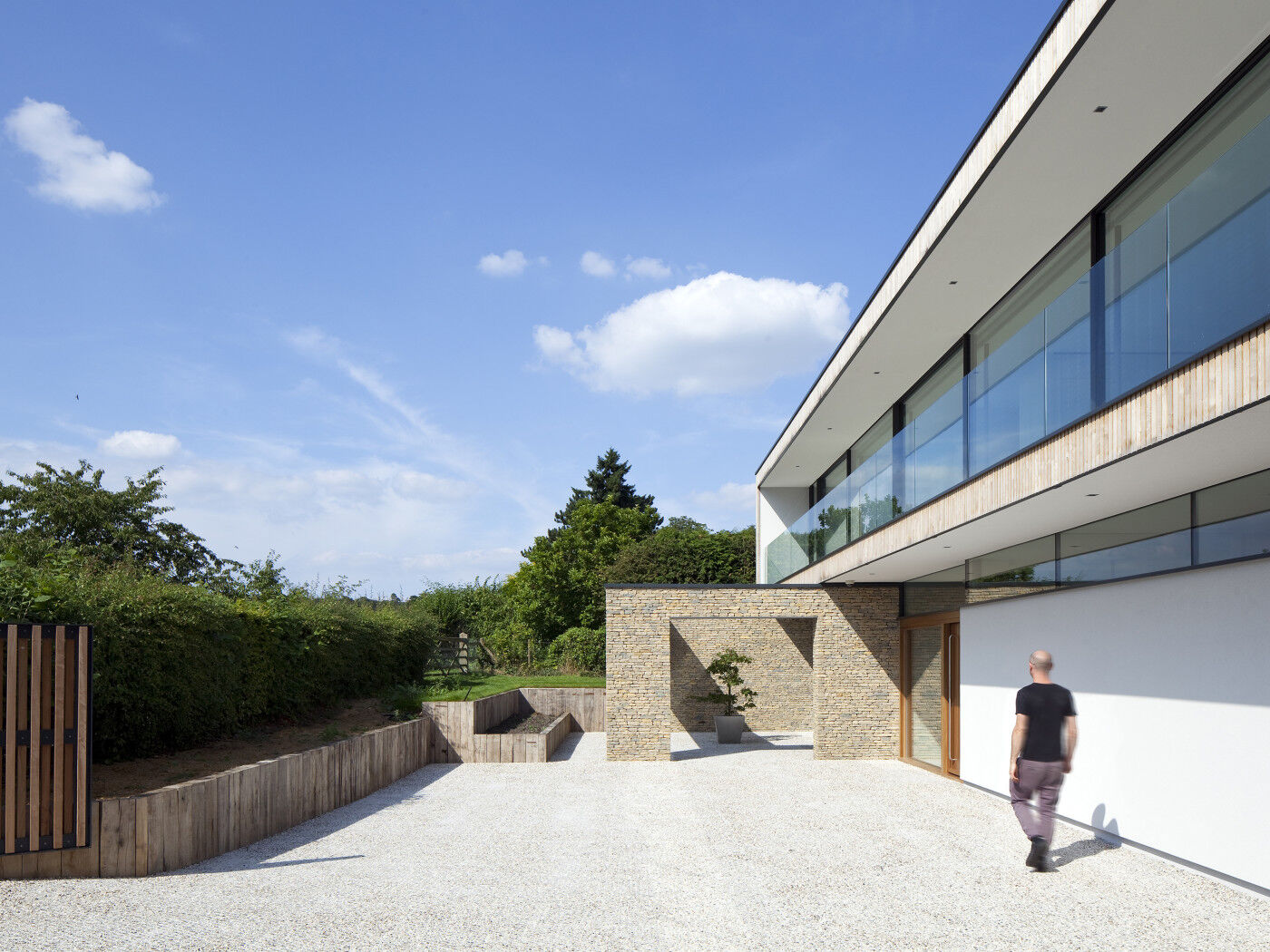Unusual design details make the external view of this minimalist house extra interesting