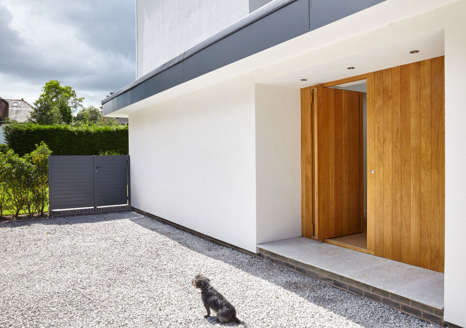 The additional wood side panel gives the impression of a larger entrance