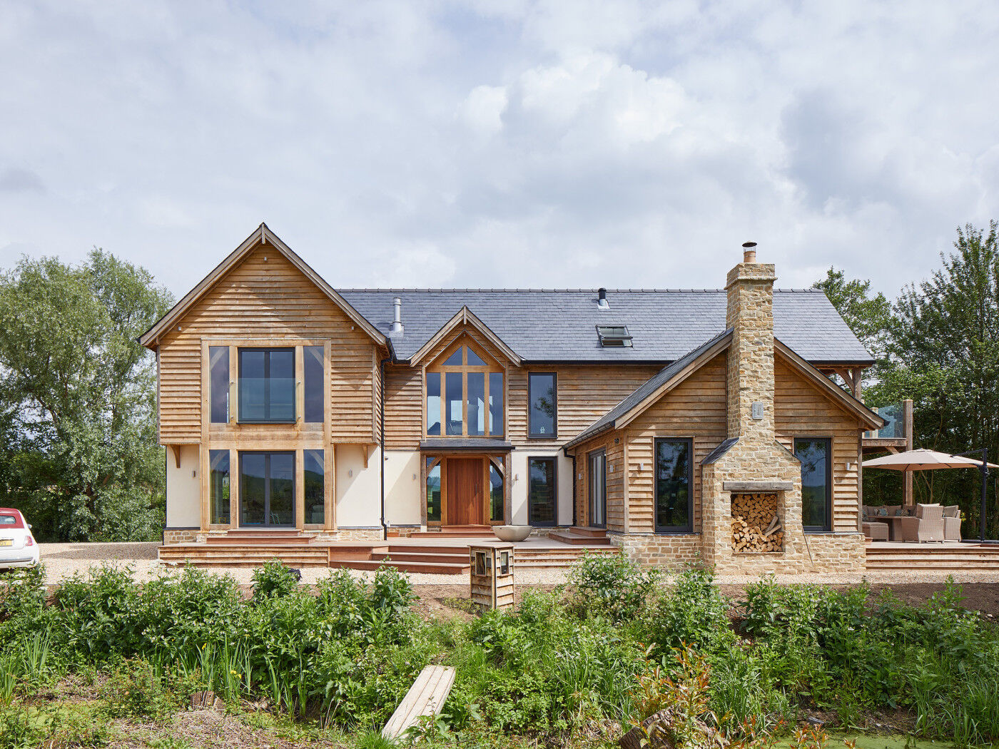 Grand but traditional styling - this oak house features an iroko front door by Urban Front 