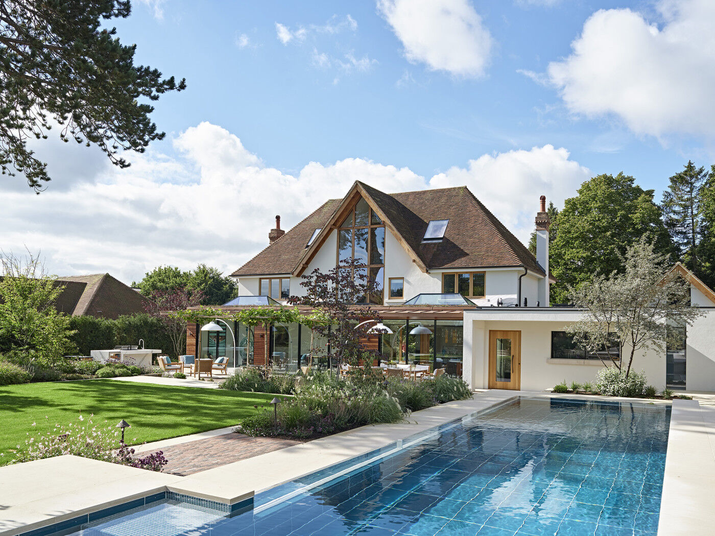 The back of the house is equally impressive with a beautiful pool