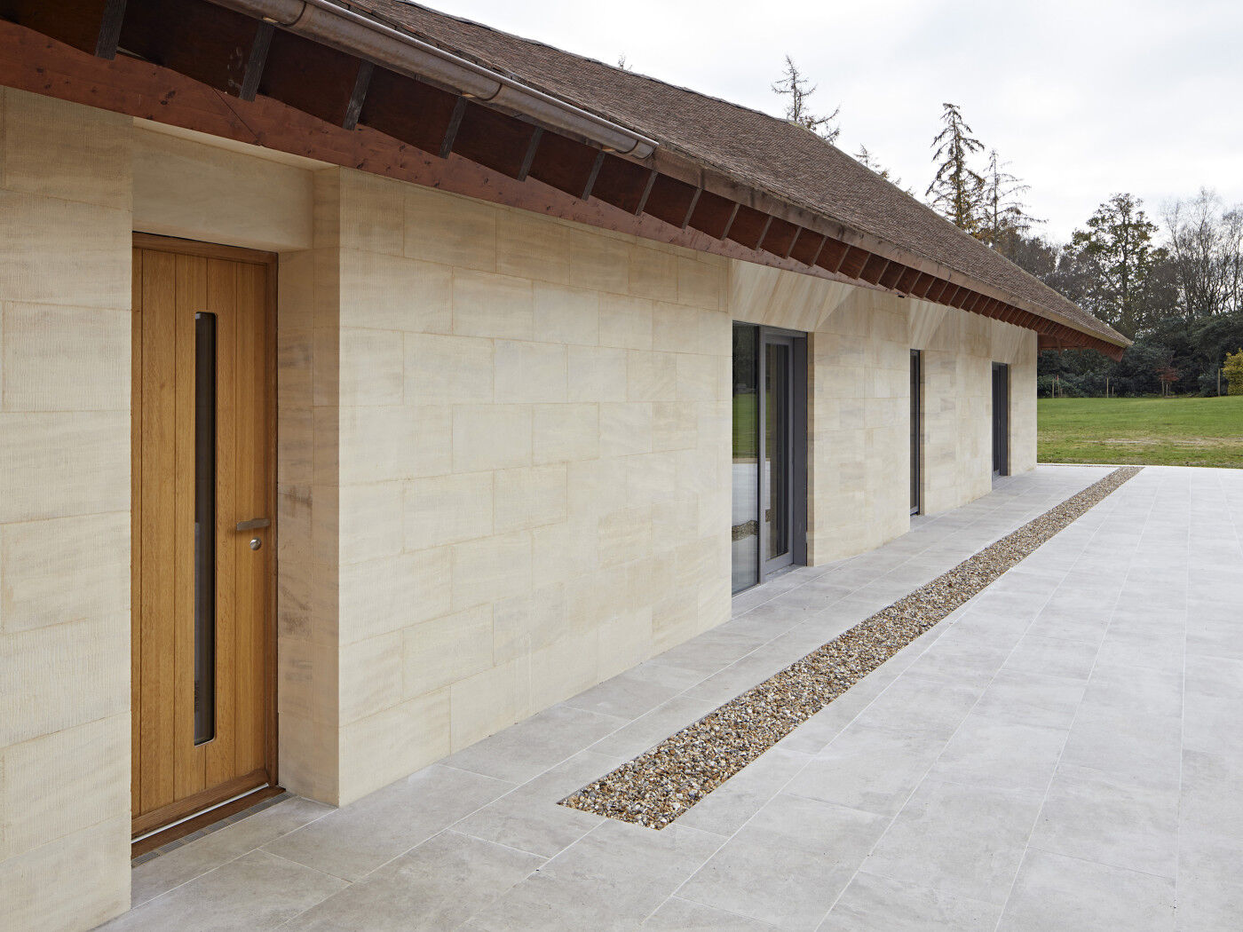 With a similar vertical panel design as the front door, the Terano also features a glass vision panel