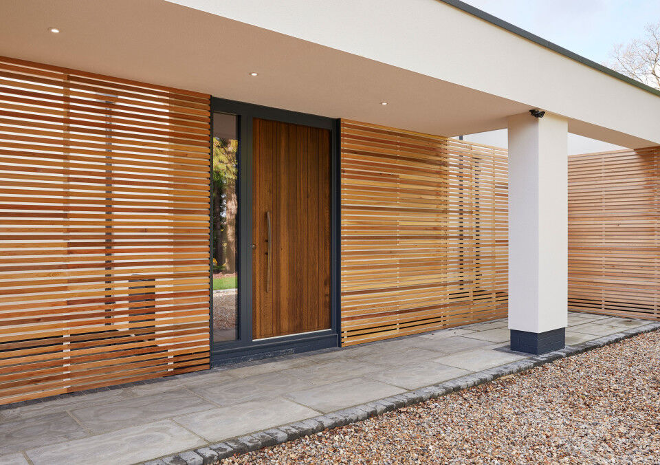 The RAL painted frame works well with the contrasting stone & timber choices