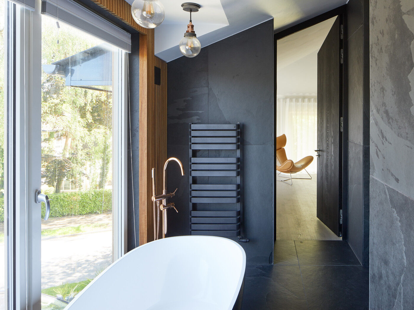 Time to relax - the additional upstairs space gave the Assafs room to create a dream en-suite complete with peaceful views from the large windows