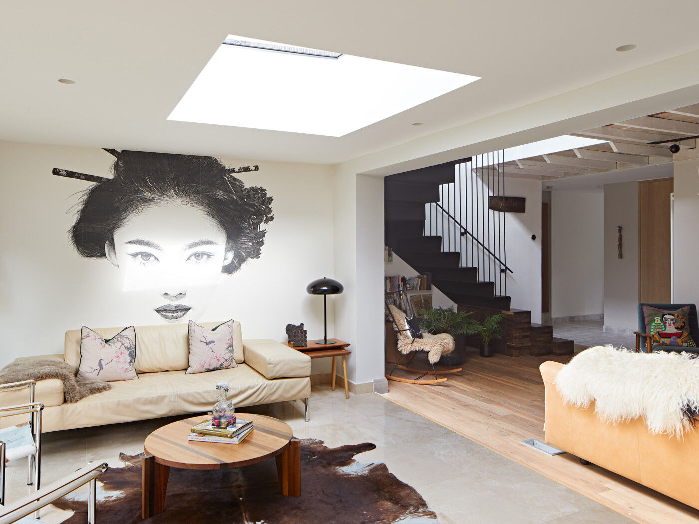 Earthy tones & multiple textures make this living space inviting and interesting