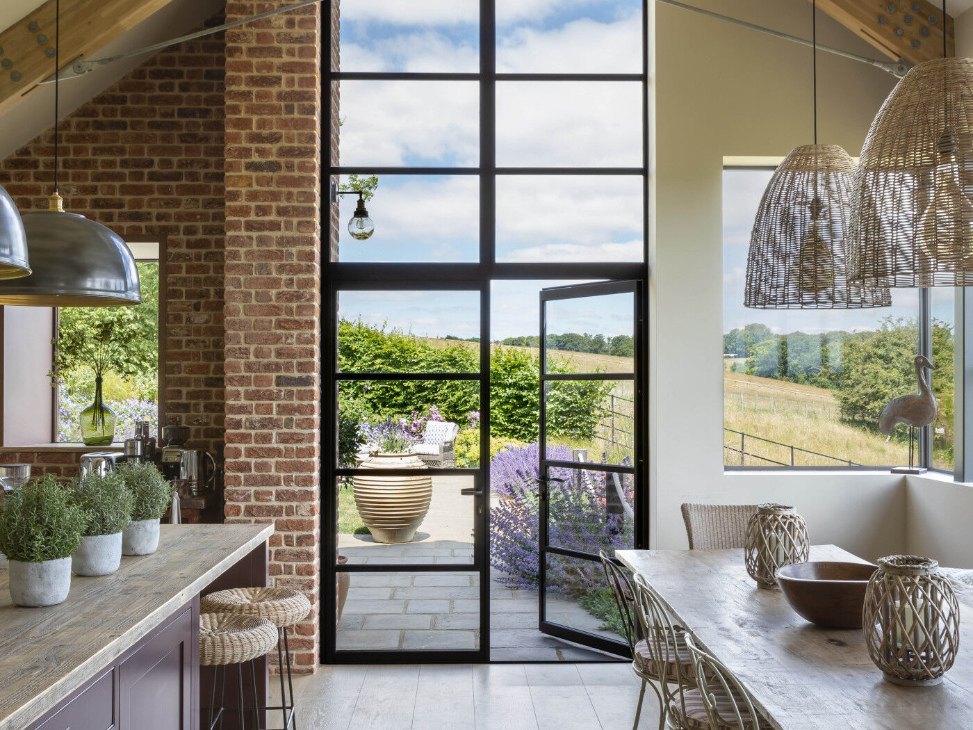 Inside, the light floods through the house and highlights the different materials