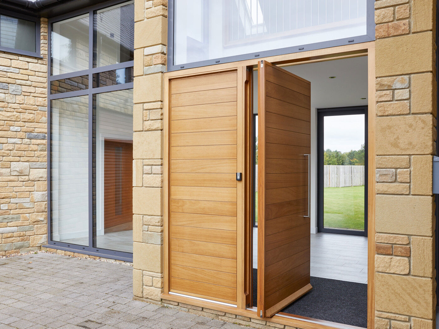 This door has a matching boarded wood side panel