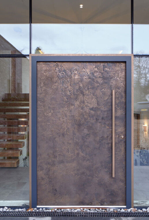 Close up of Urban Front's bronze finish front door 