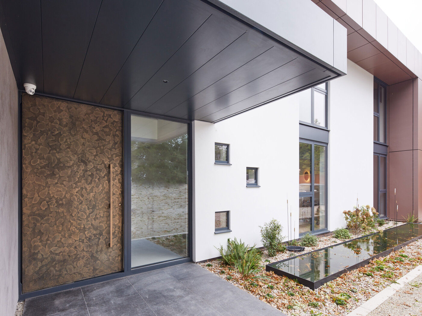 Bronze door exterior close up | Urban Front