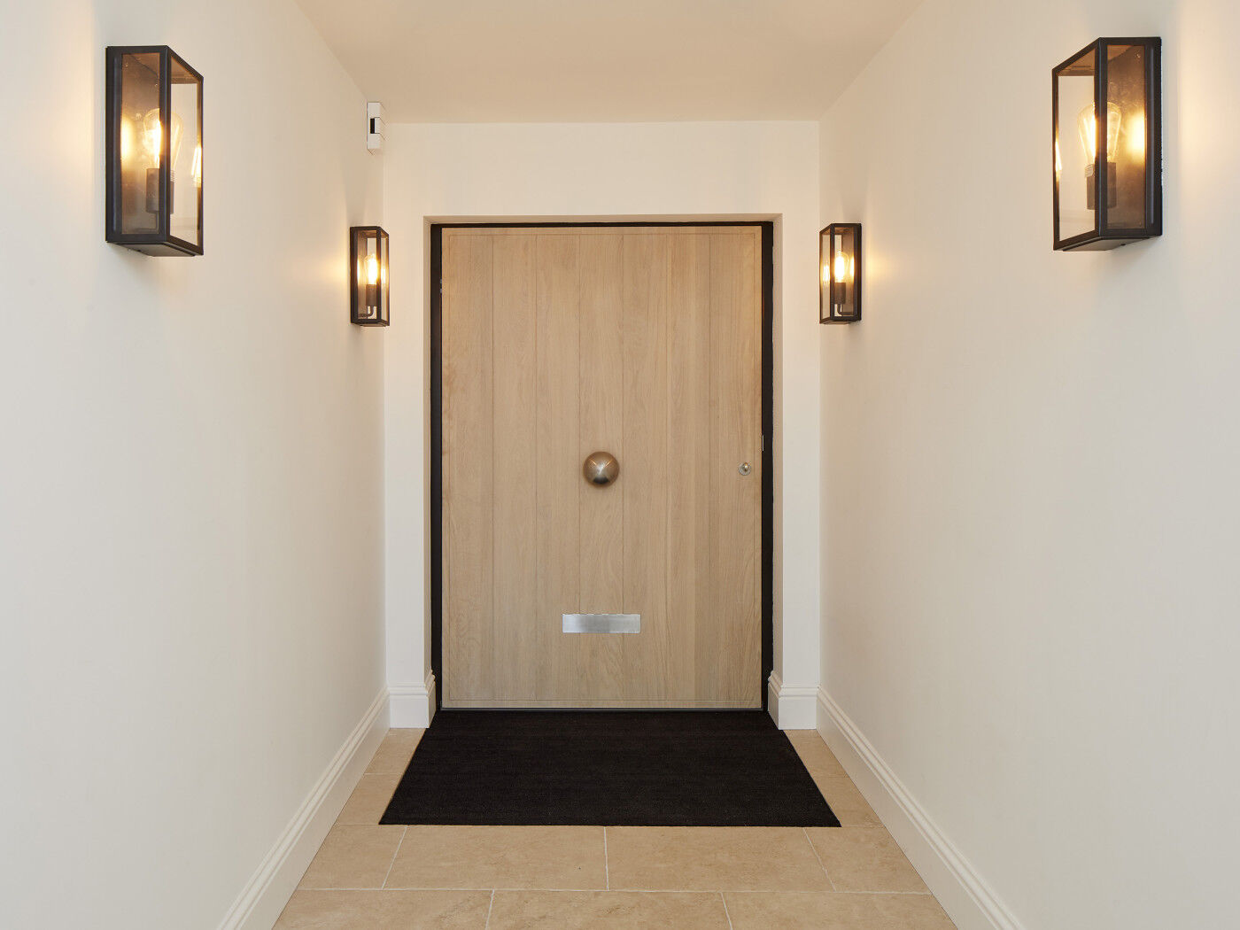 A big oak door that is no less eye-catching from the inside view