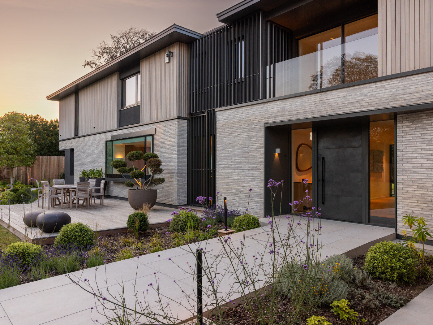 Pale bricks teamed with a bronze door make a style statement.